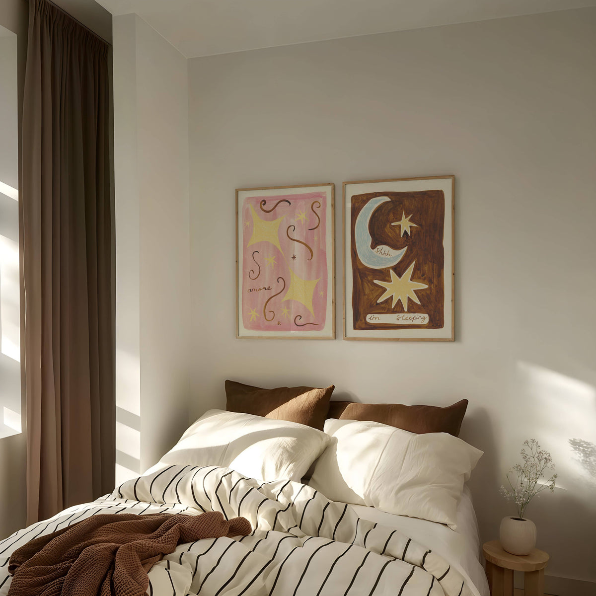 Bedroom with a bed, wall art, and a window with curtains.