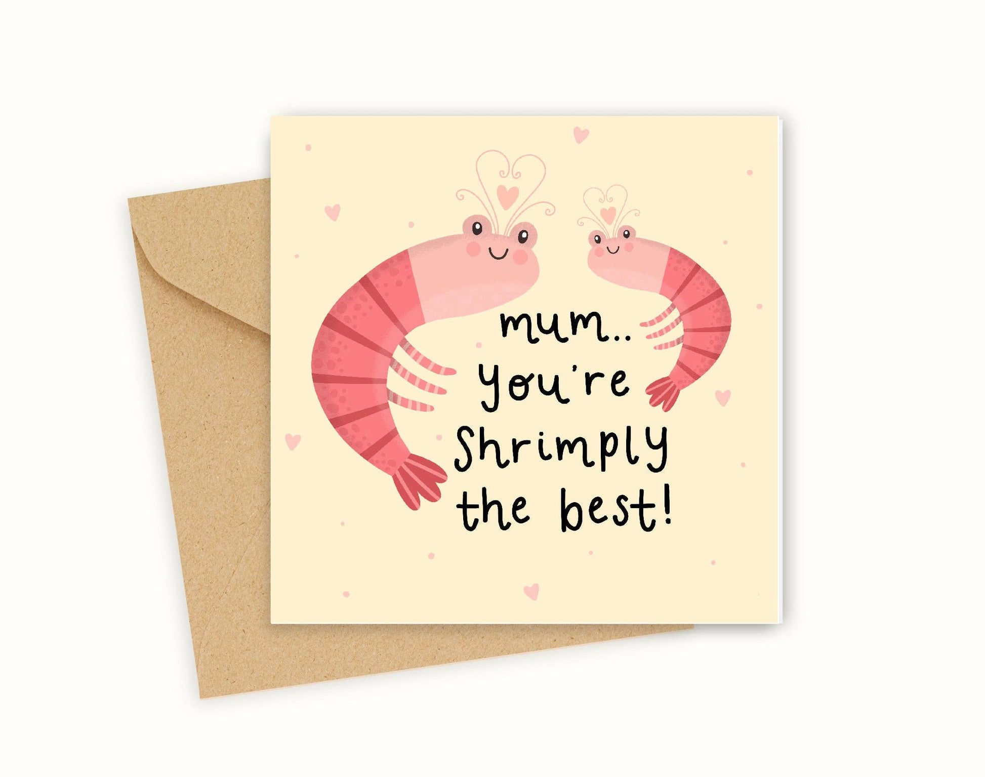 Greeting card with cartoon shrimp and text 'mum, you're shrimply the best!' on a beige background.