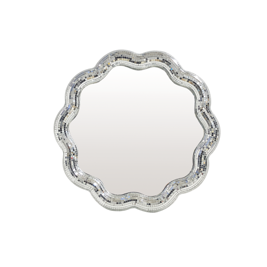 Decorative round mirror with a scalloped edge and mosaic border on a white background