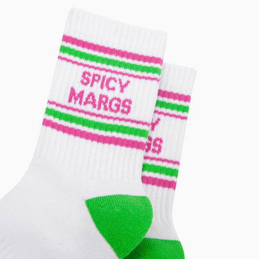 White sock with pink and green text and accents on a white background