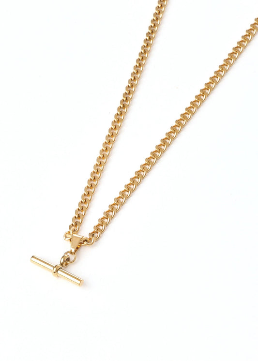 Gold chain necklace with a clasp on a white background