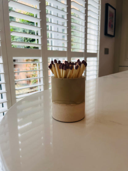 Two tone match pot with striker