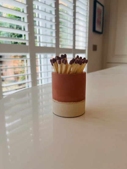 Two tone match pot with striker