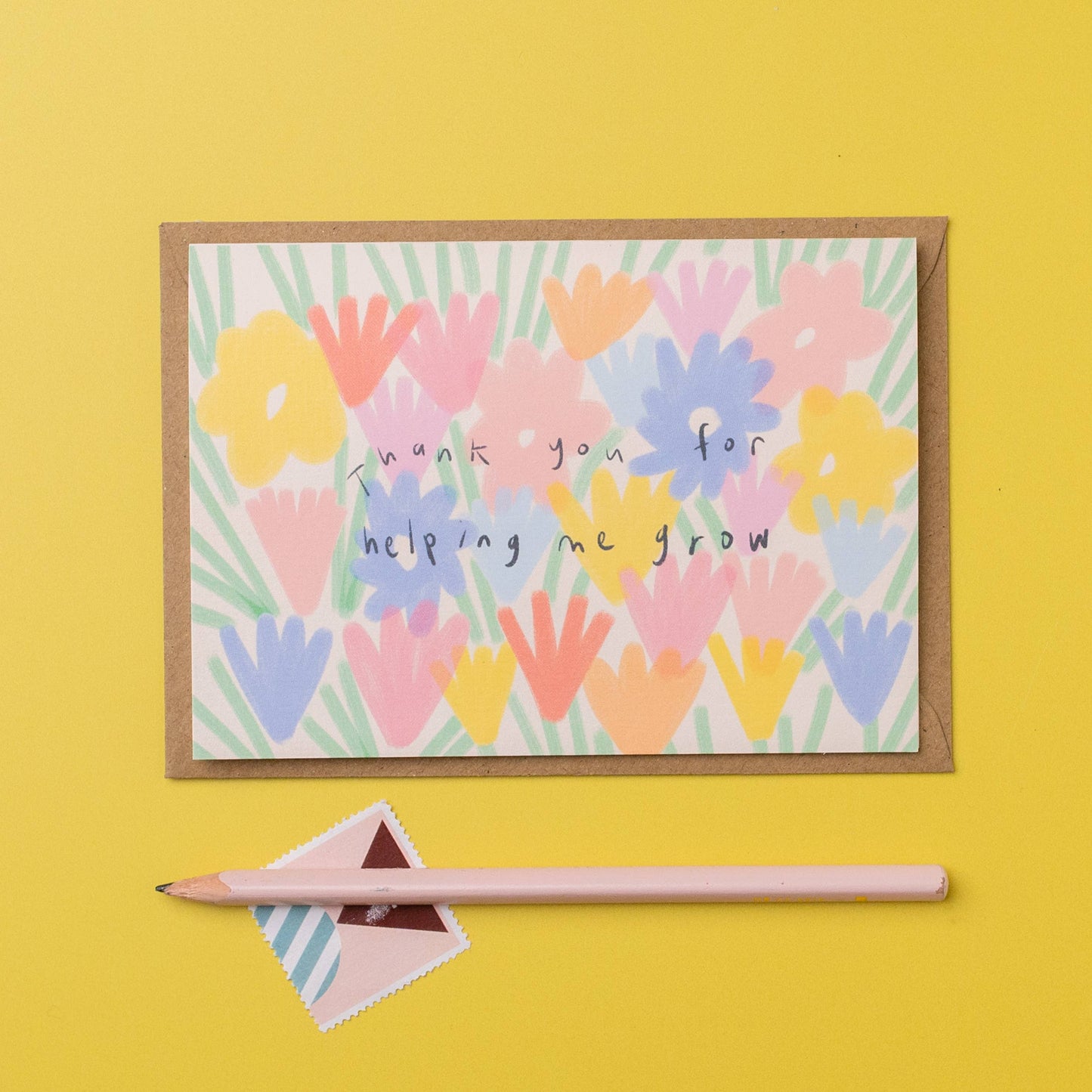 Colorful floral card with 'Thank you for helping me grow' text on a yellow background