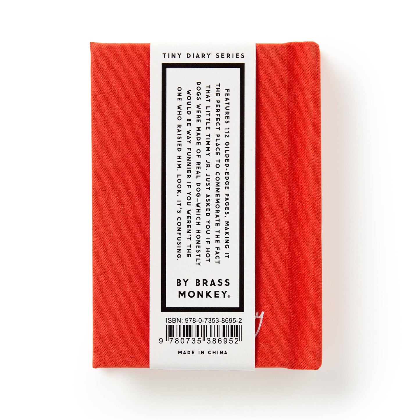 Red notebook with a white label on a white background