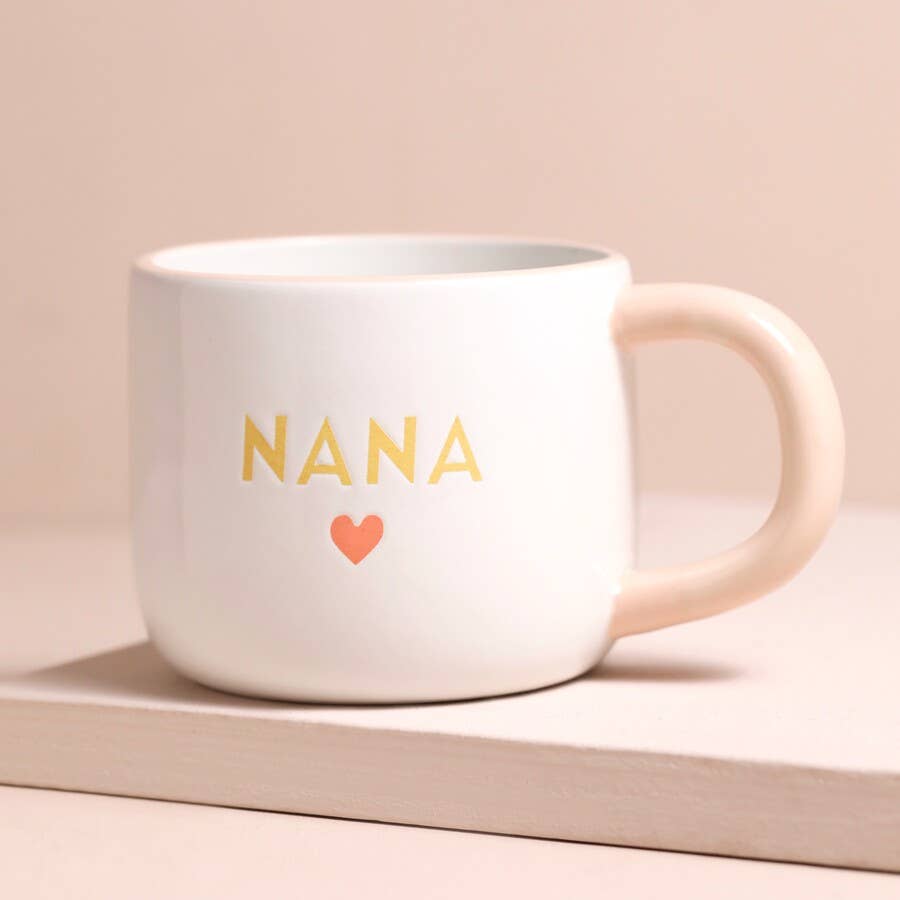 White mug with 'Nana' and a heart on a beige background