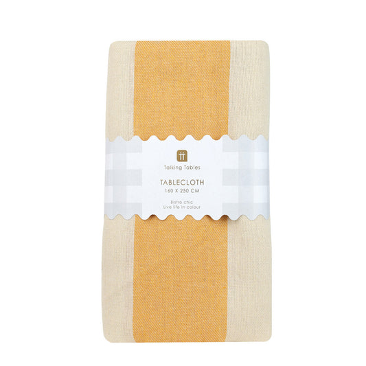Packaged tablecloth with a yellow and beige design on a white background