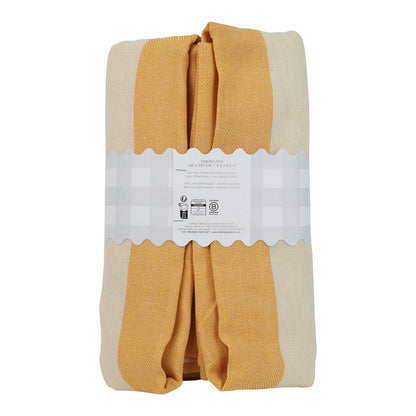 Packaged yellow and beige fabric with a label on a white background
